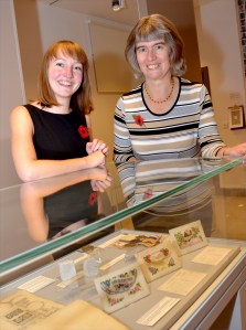 Jodie and Sally at the cabinet